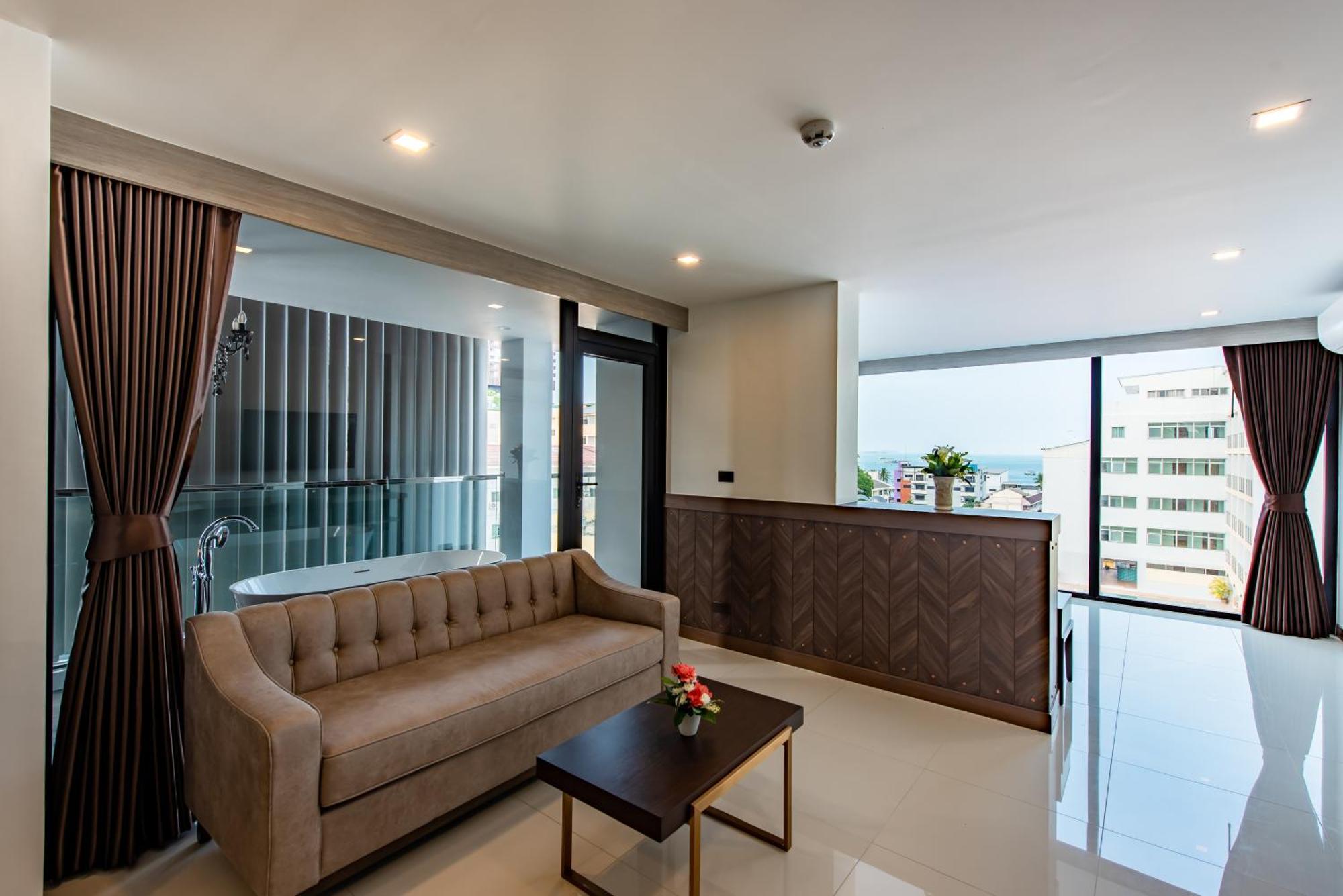 Blackwoods Hotel Pattaya - Sha Extra Plus Exterior foto A living room in a condominium